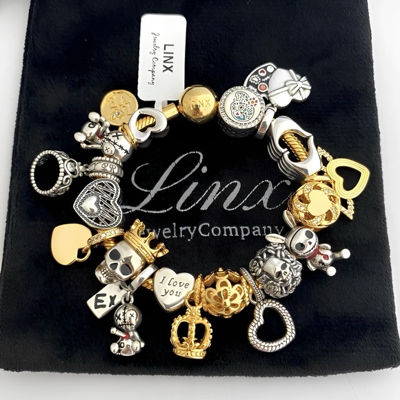 Linx Yellow Gold Snake Chain Bracelet with Skull and Heart Themed Charms